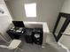 Landing area with desk, chair, and natural light from the window at 11796 Crestridge Loop, New Port Richey, FL 34655