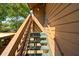 Exterior shot of a staircase leading to the entrance, showcasing the architecture and outdoor access at 1208 Cypress Pond Rd, Palm Harbor, FL 34683