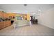 Spacious kitchen with an eat-in area, perfect for Gathering meals and entertaining guests at 1216 Yawl Way, Venice, FL 34285
