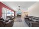 Inviting living room with comfortable seating, tile flooring, and natural light at 1216 Yawl Way, Venice, FL 34285