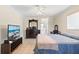 Relaxing main bedroom with furniture set, bright colors, and lots of space at 1216 Yawl Way, Venice, FL 34285