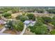 Aerial view of the property surrounded by lush greenery and neighborhood landscape at 1276 Meredith Dr, Spring Hill, FL 34608