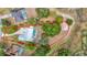 Aerial view of property including house, pool, and surrounding landscape, and marked land at 1276 Meredith Dr, Spring Hill, FL 34608