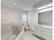 Bathroom featuring a tiled shower/tub combo, toilet, and vanity with tiled countertop at 1276 Meredith Dr, Spring Hill, FL 34608