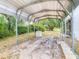 View of the steel carport on property with a generator in view at 1276 Meredith Dr, Spring Hill, FL 34608