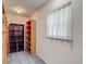 Closet with shelving and a window allowing for natural light at 1276 Meredith Dr, Spring Hill, FL 34608