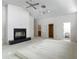Large living room with fireplace and access to multiple rooms at 1276 Meredith Dr, Spring Hill, FL 34608