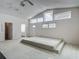 Bright living room with vaulted ceilings and large windows at 1276 Meredith Dr, Spring Hill, FL 34608