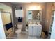 Well-lit bathroom with a stand-up shower, a cabinet, and a modern vanity with ample storage at 13100 Fish Cove Dr, Spring Hill, FL 34609