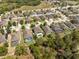 Overhead aerial shot of a neighborhood with many houses featuring backyard pools at 18331 Waydale Loop, Hudson, FL 34667