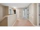 Second floor hallway includes access to bedrooms and bathrooms at 18331 Waydale Loop, Hudson, FL 34667