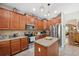 Spacious kitchen featuring stainless steel appliances, granite countertops, and backsplash at 18331 Waydale Loop, Hudson, FL 34667