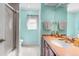Bathroom with walk-in shower and single vanity at 18663 Autumn Lake Blvd, Hudson, FL 34667