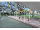 Bocce ball court with seating and shelter, ideal for leisurely games and social gatherings at 18663 Autumn Lake Blvd, Hudson, FL 34667