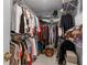 Walk-in closet with organized shelving and rods for ample storage and organization at 18663 Autumn Lake Blvd, Hudson, FL 34667