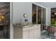 Outdoor patio with marble countertop, cabinets and access to the home interior at 18663 Autumn Lake Blvd, Hudson, FL 34667