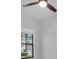 Bedroom featuring window with outside view and ceiling fan at 2431 Murray Pass, Odessa, FL 33556