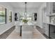 Dining room showcases modern decor, a stylish table with seating for six, and bright natural light at 2431 Murray Pass, Odessa, FL 33556
