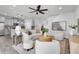Bright living room featuring modern decor, stylish furniture, and an open floor plan at 2431 Murray Pass, Odessa, FL 33556