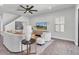 Comfortable living room with plush seating, contemporary decor, and ample natural light at 2431 Murray Pass, Odessa, FL 33556