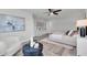 Spacious main bedroom with sitting area, lots of natural light, and modern decor at 2431 Murray Pass, Odessa, FL 33556