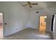 Bright bedroom with tile floors and en-suite bathroom access at 2538 Indigo Dr, Dunedin, FL 34698