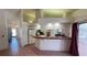 Bright kitchen with ample counter space and seamless access to dining area at 2538 Indigo Dr, Dunedin, FL 34698