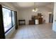 Spacious living room with tile flooring, high ceilings and a large window at 2538 Indigo Dr, Dunedin, FL 34698