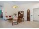 Bright living room featuring tile flooring, a comfortable sofa, and stylish mid-century modern furniture at 2924 Windridge Dr, Holiday, FL 34691