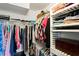 Spacious walk-in closet provides ample storage for clothing, shoes, and accessories at 312 Barrington Ct, Spring Hill, FL 34609