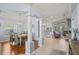 Open-concept dining area with stylish light fixture flows seamlessly into the adjacent living spaces at 312 Barrington Ct, Spring Hill, FL 34609