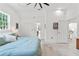 Large bedroom with a view of an ensuite bathroom and a set of double closets at 3431 Saturn Rd, Brooksville, FL 34604