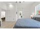 Inviting bedroom with bright light offering a view of the ensuite bathroom at 3431 Saturn Rd, Brooksville, FL 34604