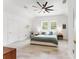 Bright and airy bedroom with ample natural light and a modern ceiling fan at 3431 Saturn Rd, Brooksville, FL 34604