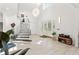 Grand foyer with staircase, decorative chandelier, and a bright, inviting atmosphere at 3431 Saturn Rd, Brooksville, FL 34604