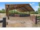 Covered horse arena with sand footing, sturdy fencing and ample space for equestrian activities at 3431 Saturn Rd, Brooksville, FL 34604