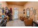 Comfortable living area with rustic walls, ample seating and charming decorations at 3431 Saturn Rd, Brooksville, FL 34604