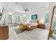 Spacious main bedroom features a sitting area with natural light from bright windows at 3431 Saturn Rd, Brooksville, FL 34604