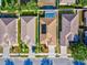 Aerial view of the home showcasing the private pool, backyard, and surrounding neighborhood at 4321 High Ridge Ave, Spring Hill, FL 34609
