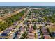 Aerial view of the home in a suburban neighborhood with easy access to highways and urban areas at 4321 High Ridge Ave, Spring Hill, FL 34609