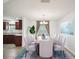 Bright dining room featuring a wooden table with white chairs at 4321 High Ridge Ave, Spring Hill, FL 34609