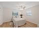 Cozy bedroom with a large window and comfortable queen-size bed at 4504 Dewey Dr, New Port Richey, FL 34652