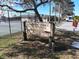 Community recreational facility sign near a tennis court at 4504 Dewey Dr, New Port Richey, FL 34652