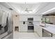 Bright, renovated kitchen with modern stainless-steel appliances at 4504 Dewey Dr, New Port Richey, FL 34652