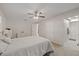 Bright main bedroom with ensuite bathroom featuring dual closets at 4504 Dewey Dr, New Port Richey, FL 34652