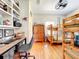 Multi bunkbeds are included in this bedroom with hardwood floors and nice shelving at 4514 Fishman Ave, Weeki Wachee, FL 34607