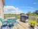 Inviting outdoor deck featuring comfortable seating and scenic views at 4514 Fishman Ave, Weeki Wachee, FL 34607