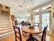 Inviting dining area with hardwood floors and access to a bright living space at 4514 Fishman Ave, Weeki Wachee, FL 34607