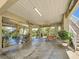 Expansive covered ground floor features outdoor furniture, nautical decor, and access to the upper levels at 4514 Fishman Ave, Weeki Wachee, FL 34607