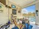 Relaxing screened-in patio with comfortable seating and a serene atmosphere at 4514 Fishman Ave, Weeki Wachee, FL 34607